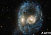 哈勃望遠鏡捕捉的，在猛烈星系合併中出現的“詭異宇宙面孔”，長啥樣？